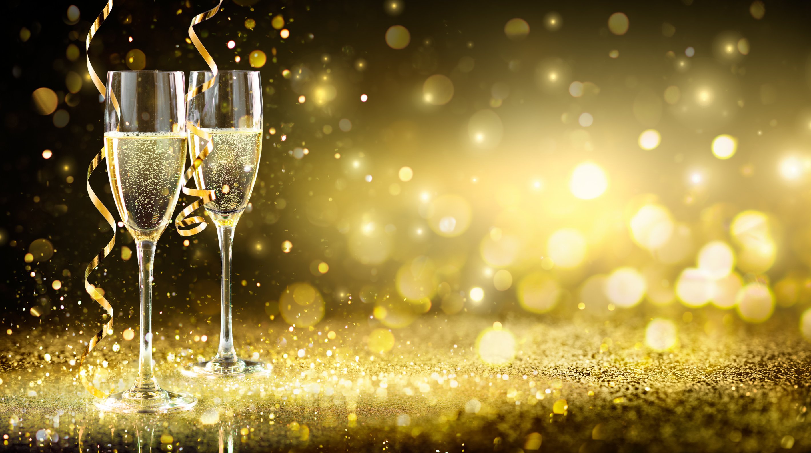 Champagne Flutes In Golden Sparkle Background - Happy New Year